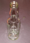 Vase aus einer Glasflasche basteln